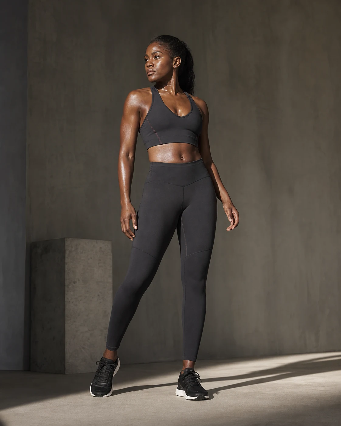 Athlete in a black performance set
